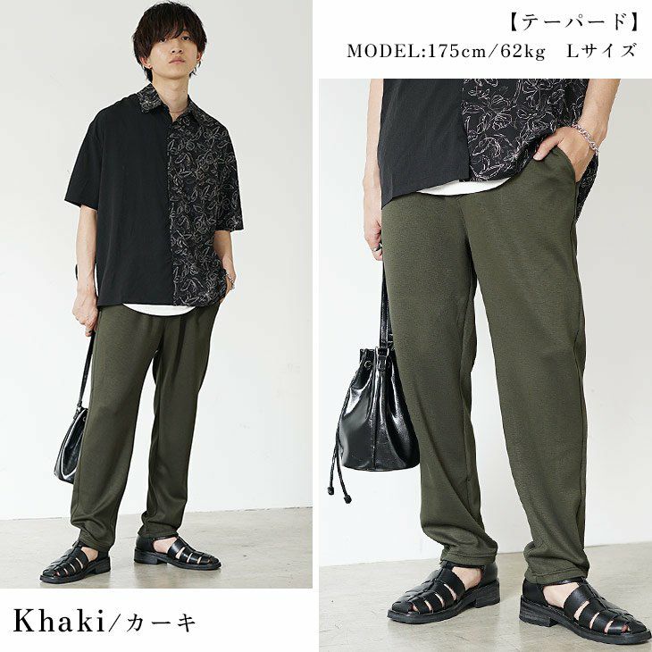 アシンメトリーなブラックシャツとカーゴパンツのモードストリートスタイル